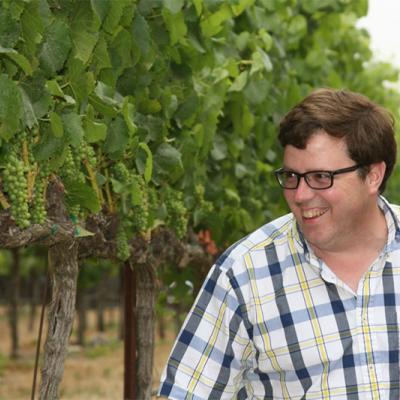 Adam Lee in vineyard