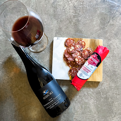 Bottle with salame
